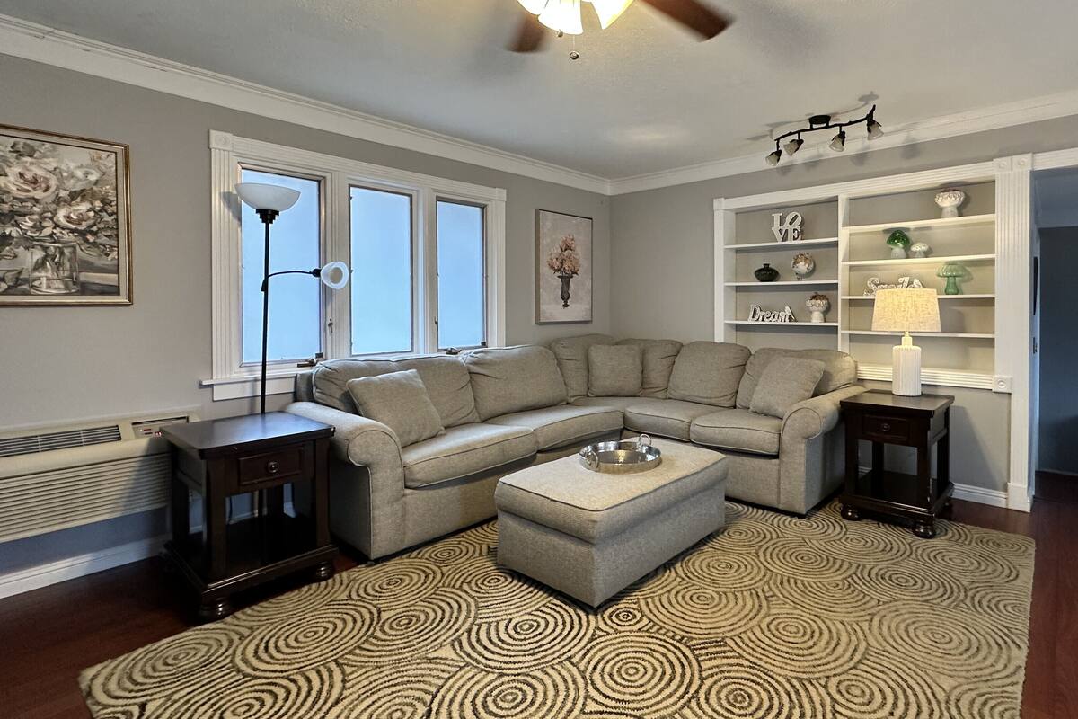 Suite, 2 Bedrooms | Living area | 32-inch flat-screen TV with cable channels, TV