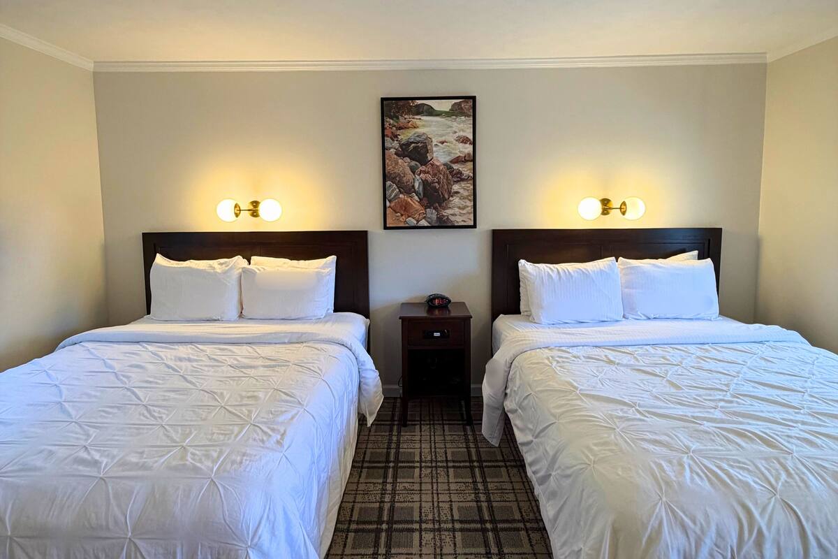 Room, 2 Queen Beds | Blackout drapes, iron/ironing board, WiFi (free), bed sheets