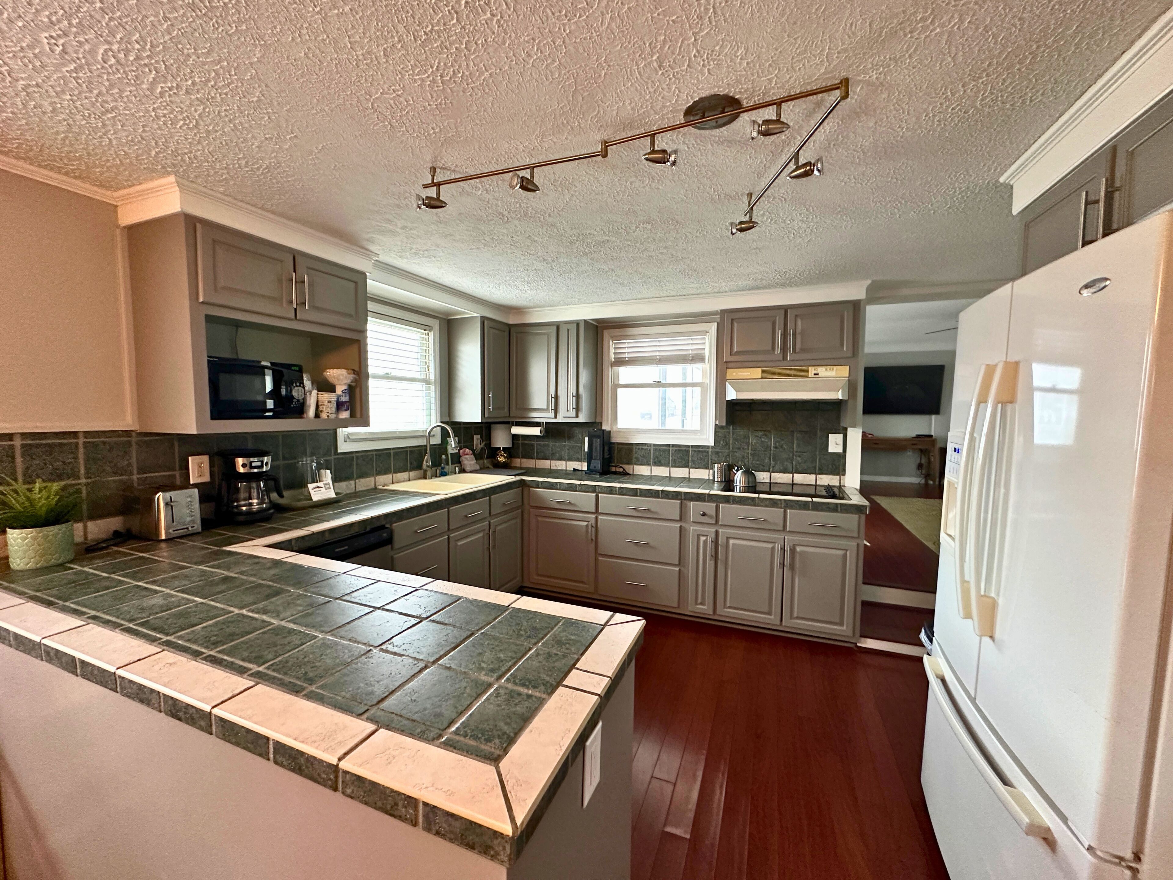 Suite, 2 Bedrooms | Private kitchen | Coffee/tea maker, mini-fridge, microwave
