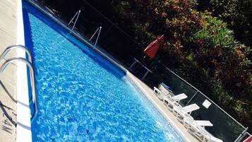 Outdoor pool, open 8:30 AM to 9:00 PM, sun loungers