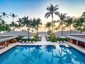 Outdoor pool, open 7 AM to 7 PM, pool umbrellas, sun loungers