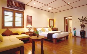 Family Suite, Beachfront | Minibar, in-room safe, desk, blackout drapes