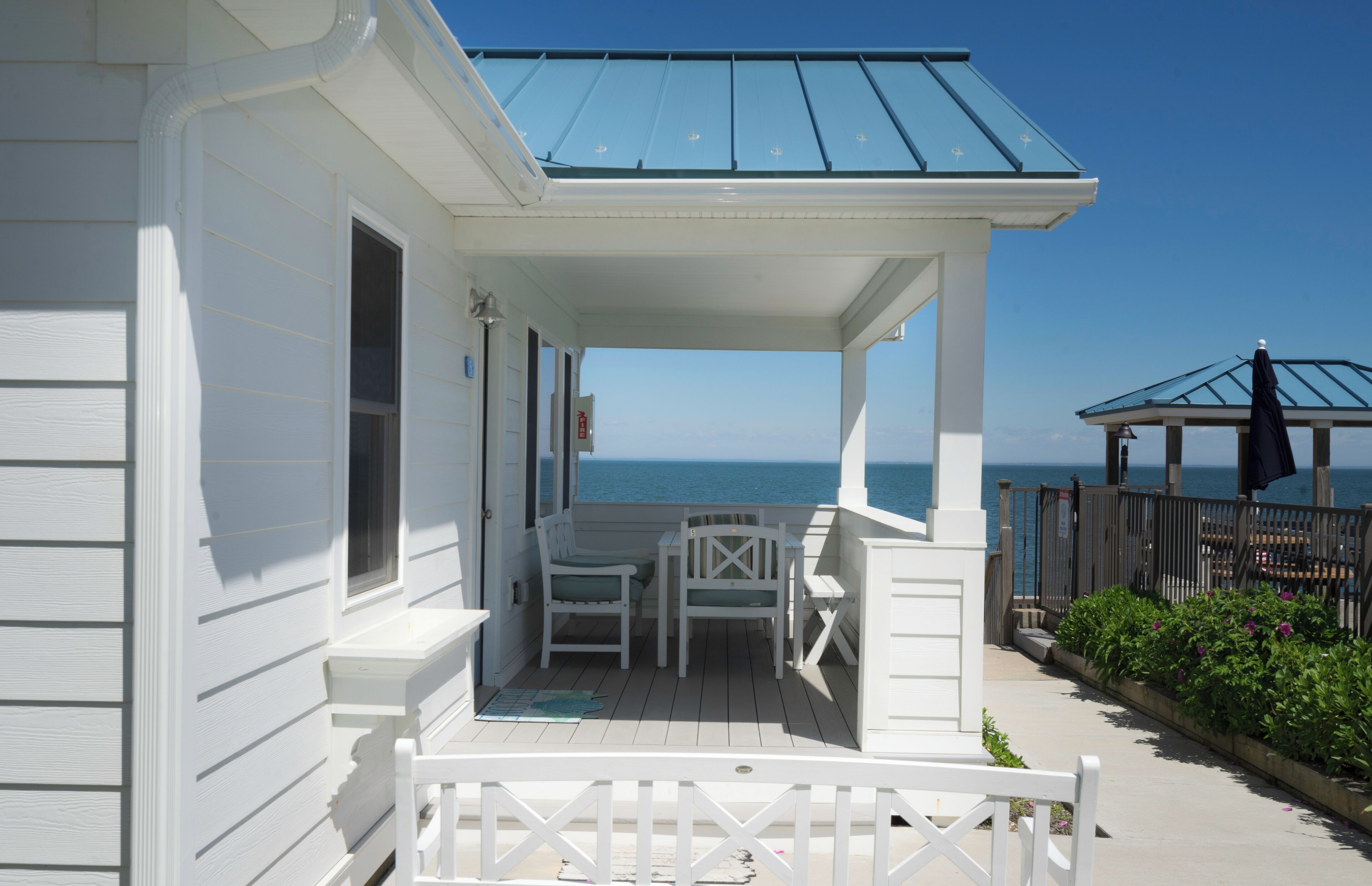 Premier Cottage, 2 Bedrooms, Sea View, Poolside | Terrace/patio