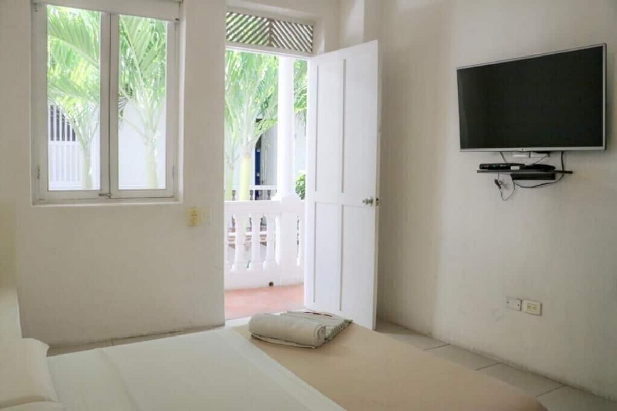 Blackout curtains, rollaway beds, free WiFi, bed sheets