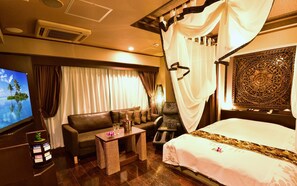 Premium bedding, blackout curtains, iron/ironing board