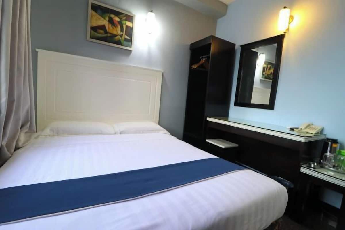 Desk, blackout curtains, iron/ironing board (on request), free WiFi
