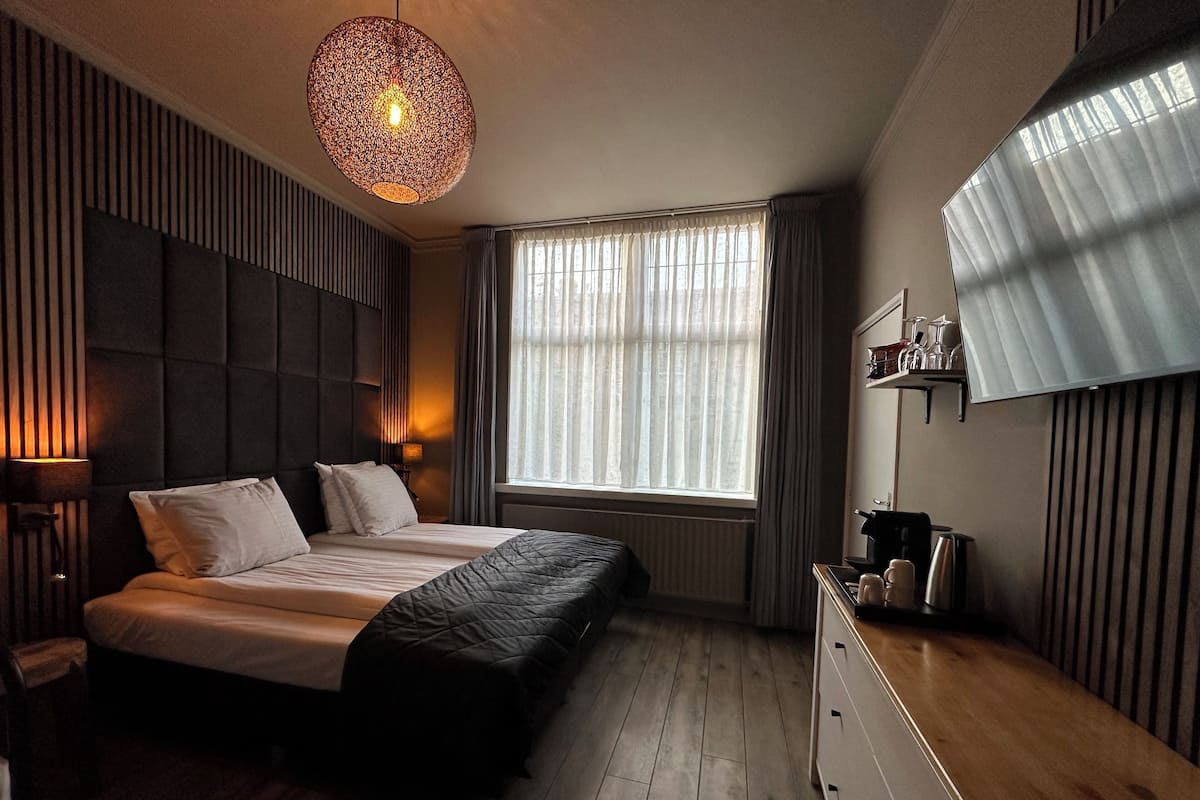 Familiekamer, privébadkamer, uitzicht op binnenplaats | 1 slaapkamer, luxe beddengoed, een minibar, individueel gedecoreerd