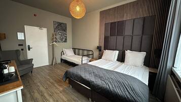 Family Room, Private Bathroom, Courtyard View | Premium bedding, minibar, individually decorated, individually furnished