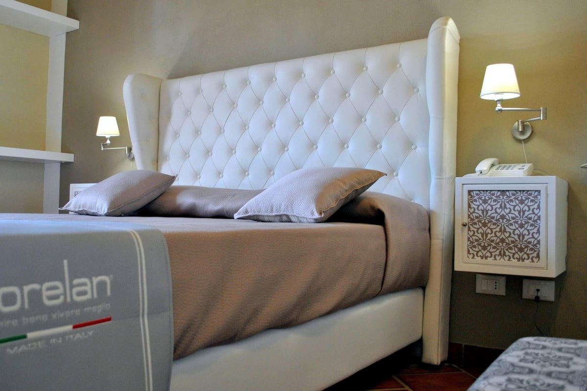 Egyptian cotton sheets, premium bedding, down duvets, memory-foam beds
