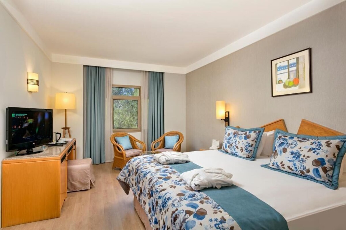 Family Suite | Minibar (inkludert), safe på rommet og lydisolert