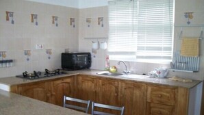 Bungalow, 1 Bedroom, Mountain View | Private kitchen | Coffee/tea maker, full-size fridge, microwave, stovetop