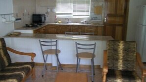 Bungalow, 1 Bedroom, Mountain View | Private kitchen | Coffee/tea maker, full-size fridge, microwave, stovetop
