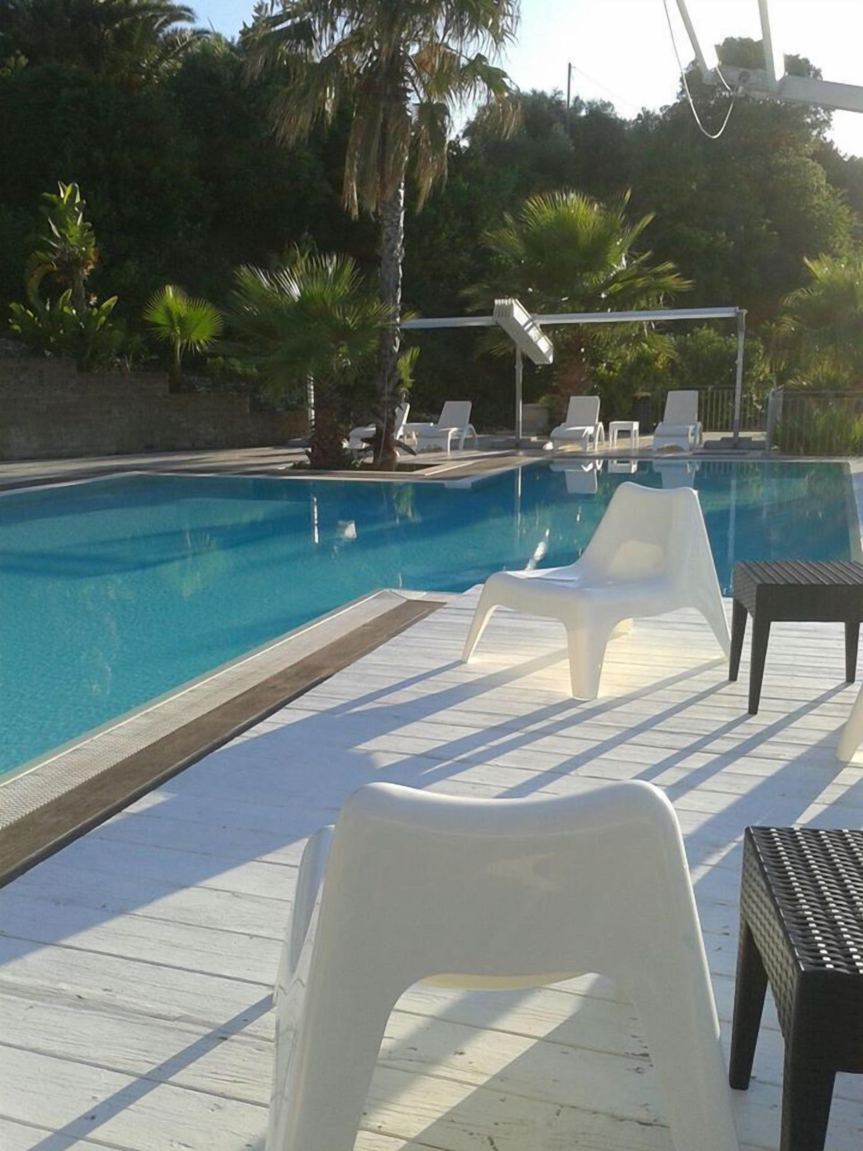 outdoor pool, pool loungers