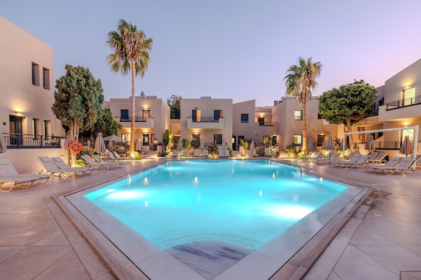 Seasonal outdoor pool, open 9:00 AM to 8:00 PM, sun loungers