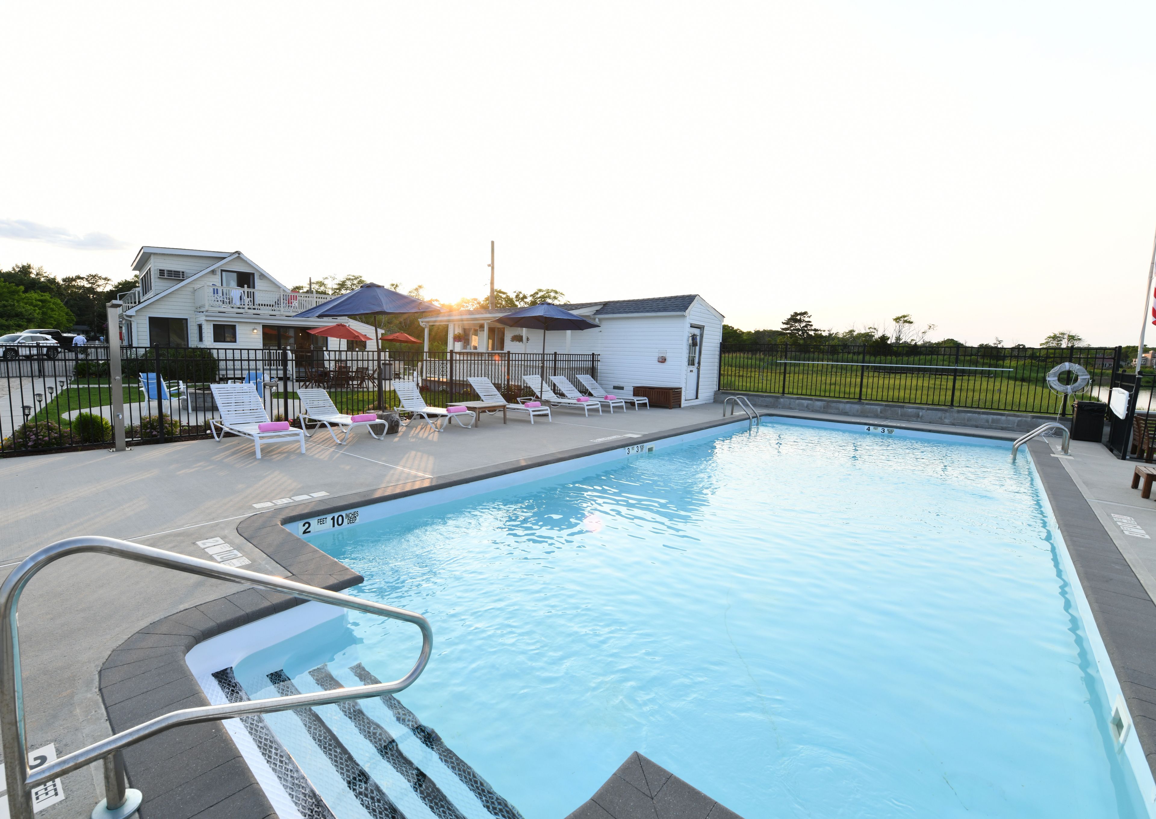 Seasonal outdoor pool, open 9:00 AM to 8:00 PM, free cabanas