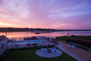 Seasonal outdoor pool, open 9:00 AM to 8:00 PM, free pool cabanas