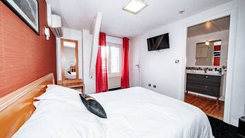 Roupas de cama premium, cofres nos quartos, individualmente decorados