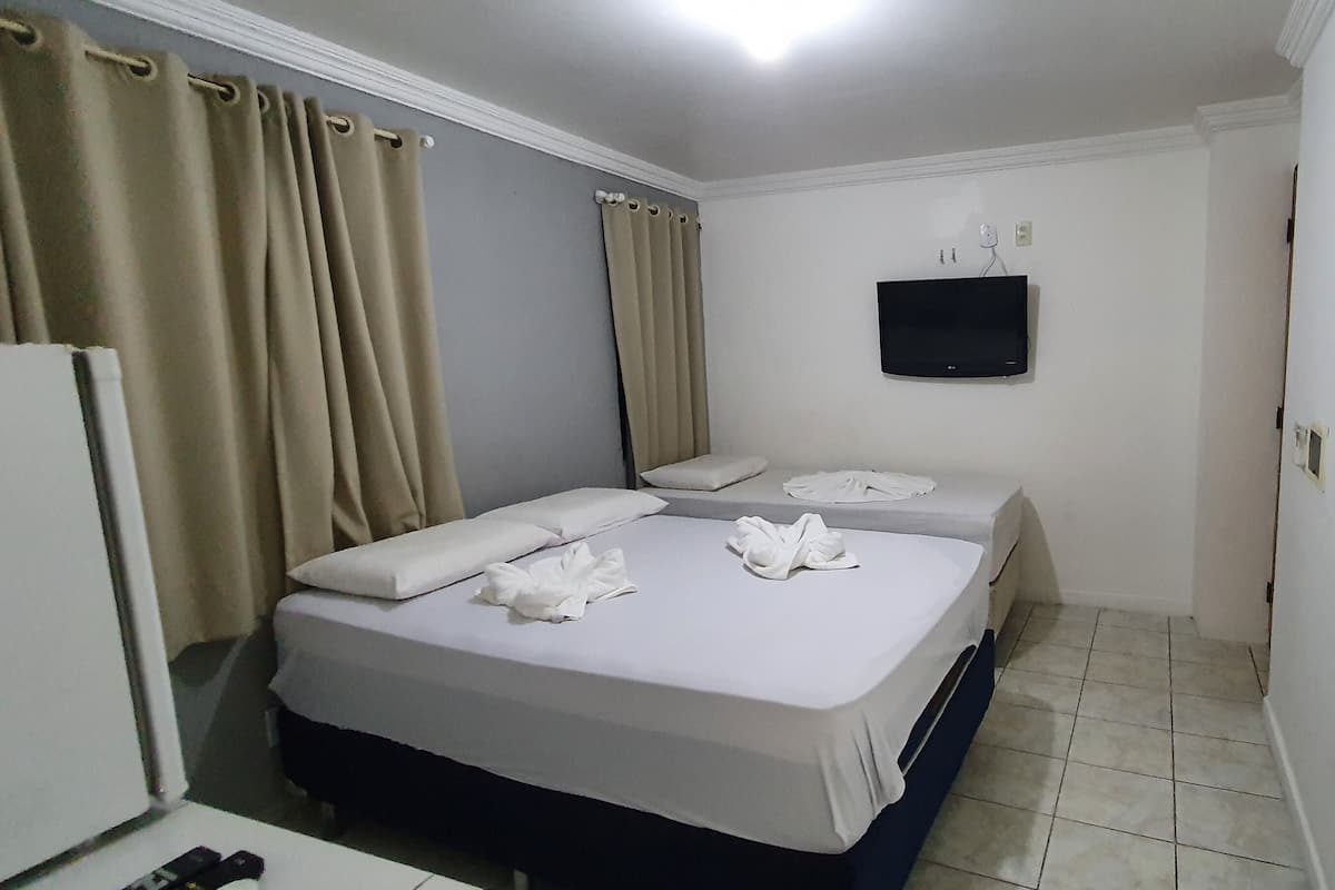 Triple Room, Multiple Beds | 1 bedroom, minibar, free WiFi, bed sheets