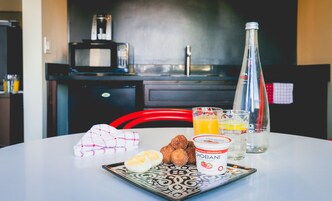 Deluxe Room, 2 Double Beds, Kitchenette | In-room dining