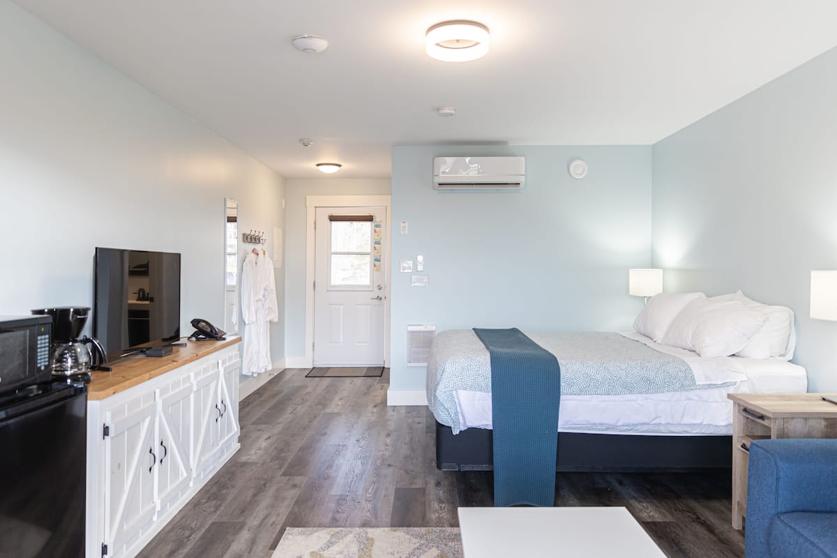 Studio, 1 Queen Bed, Partial Ocean View, Not Ocean Front | Living area | 60-inch flat-screen TV with cable channels, TV