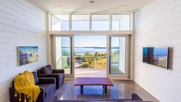 60-inch flat-screen TV with cable channels, TV