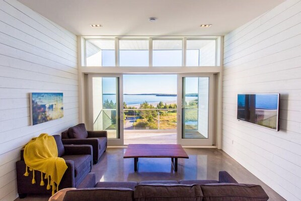 60-inch flat-screen TV with cable channels, TV