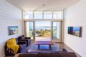 60-inch flat-screen TV with cable channels, TV