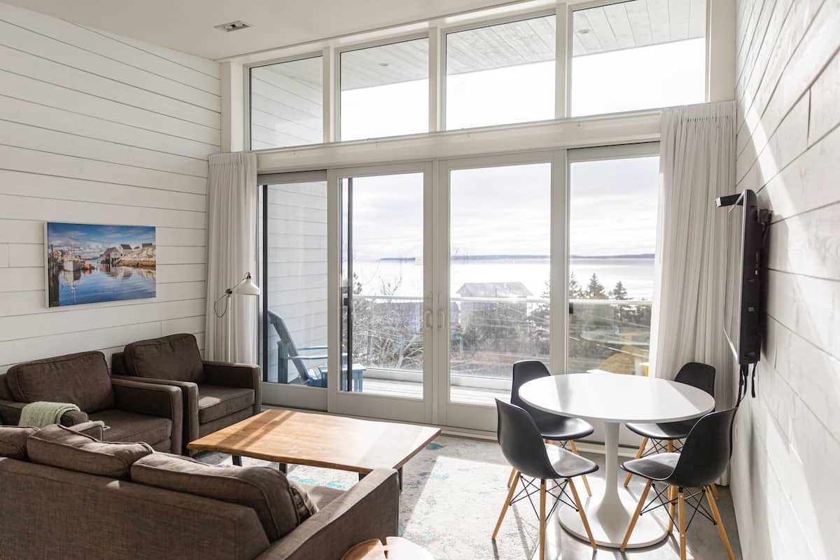 Deluxe Loft, 2 Bedrooms, Not Ocean Front | Living area | 60-inch flat-screen TV with cable channels, TV