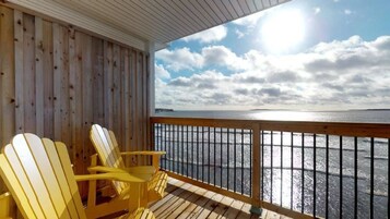 Signature Studio, 1 Queen Bed, Beachfront | Living area | 60-inch flat-screen TV with cable channels, TV