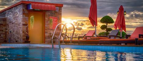 Outdoor pool, sun loungers