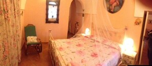 Casa tradicional, 1 cama matrimonial y sofá cama, en el área del jardín