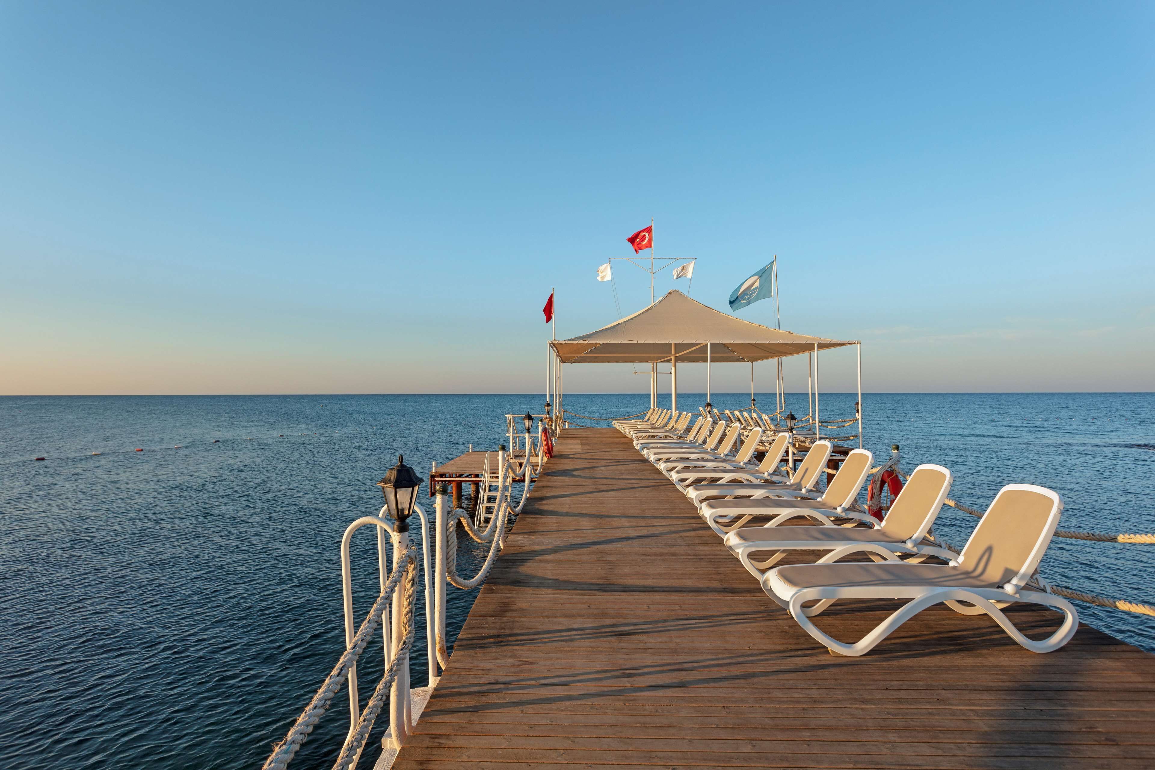 private beach, beach cabanas, sun-loungers, beach umbrellas