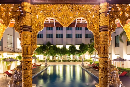 Outdoor pool, open 7:00 AM to 8:00 PM, pool umbrellas, pool loungers. Mida Grande Hotel Dhavaravati, Nakhon Pathom
