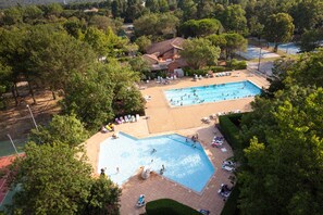 Seasonal outdoor pool, pool loungers