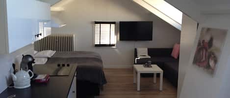 Loft | Sala de estar | TV de tela plana