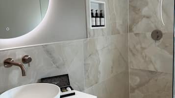 Shower, free toiletries, hair dryer, towels