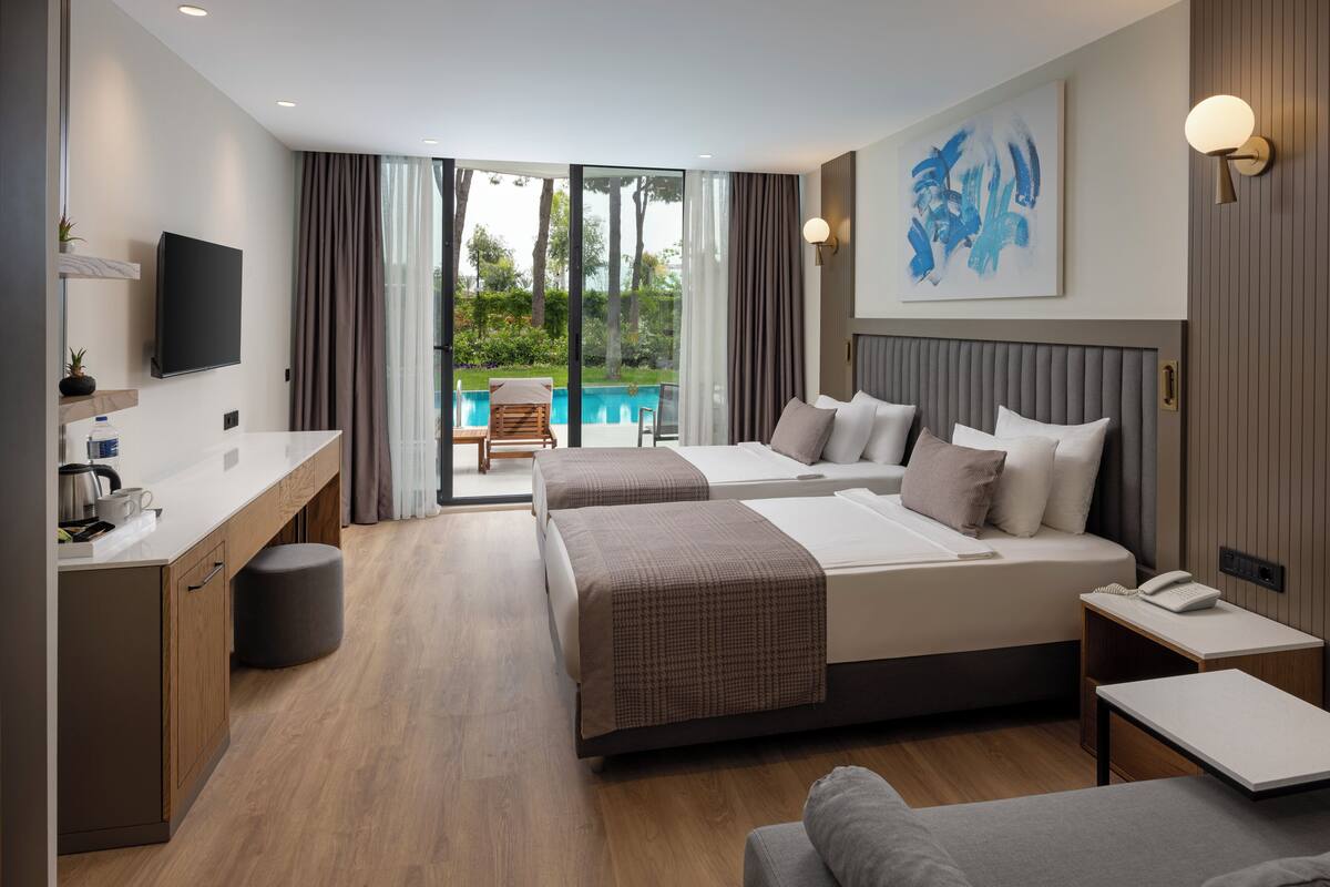 Superior Room, Pool View | Free minibar, in-room safe, desk, laptop workspace