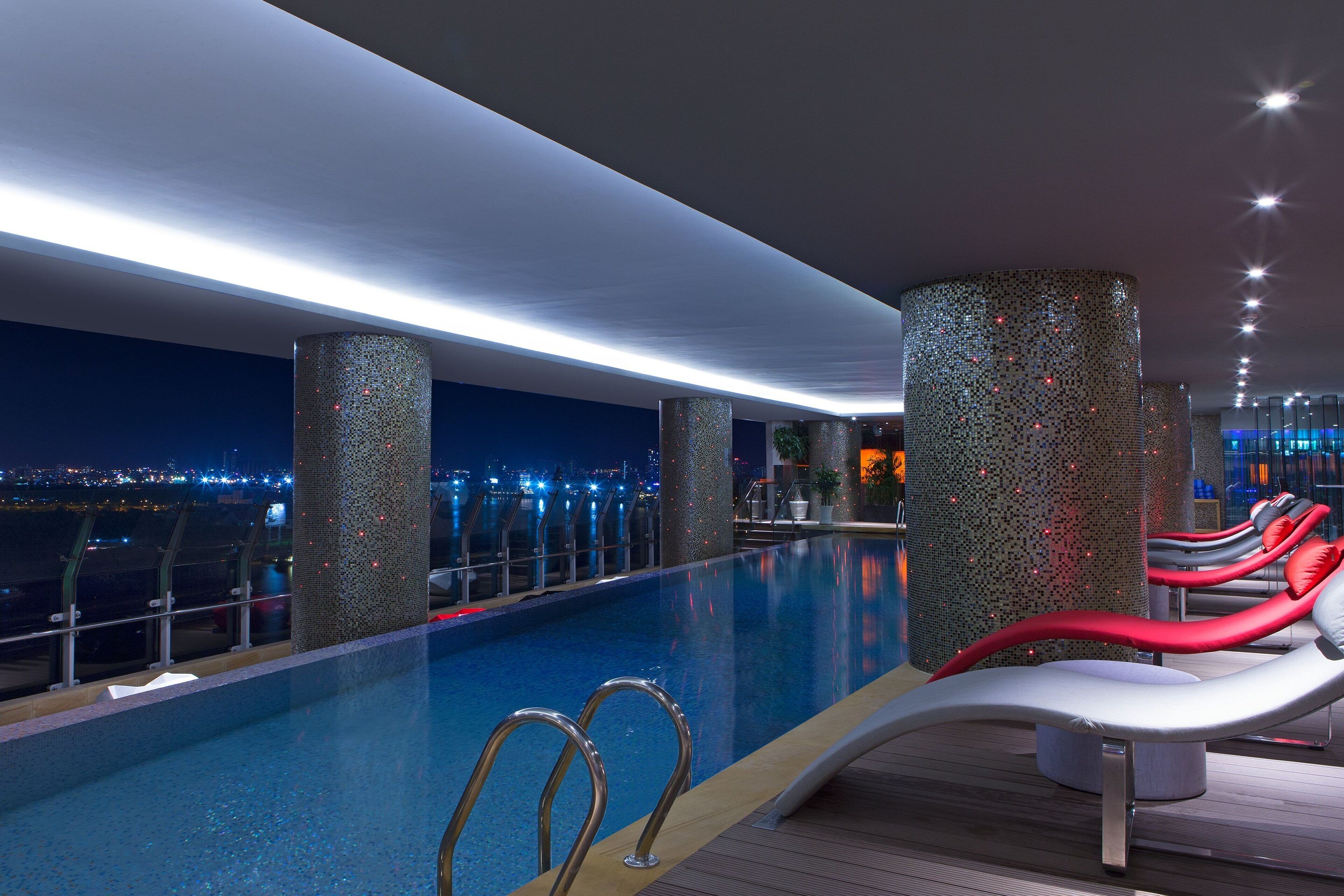 Outdoor pool, open 6:00 AM to 10:00 PM, pool umbrellas, sun loungers