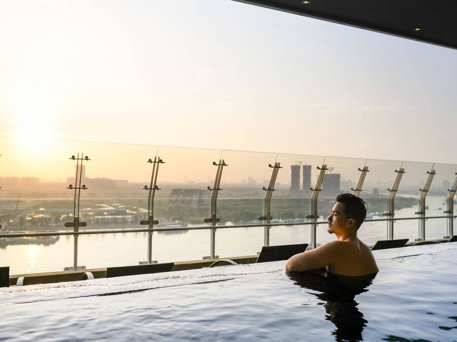 Outdoor pool, open 6:00 AM to 10:00 PM, pool umbrellas, sun loungers