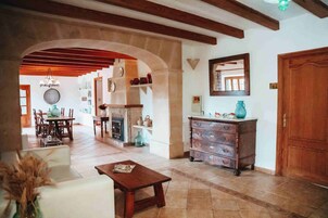Quarto casal | Área de estar | TV de tela plana