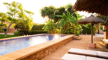 2 outdoor pools, pool umbrellas, pool loungers