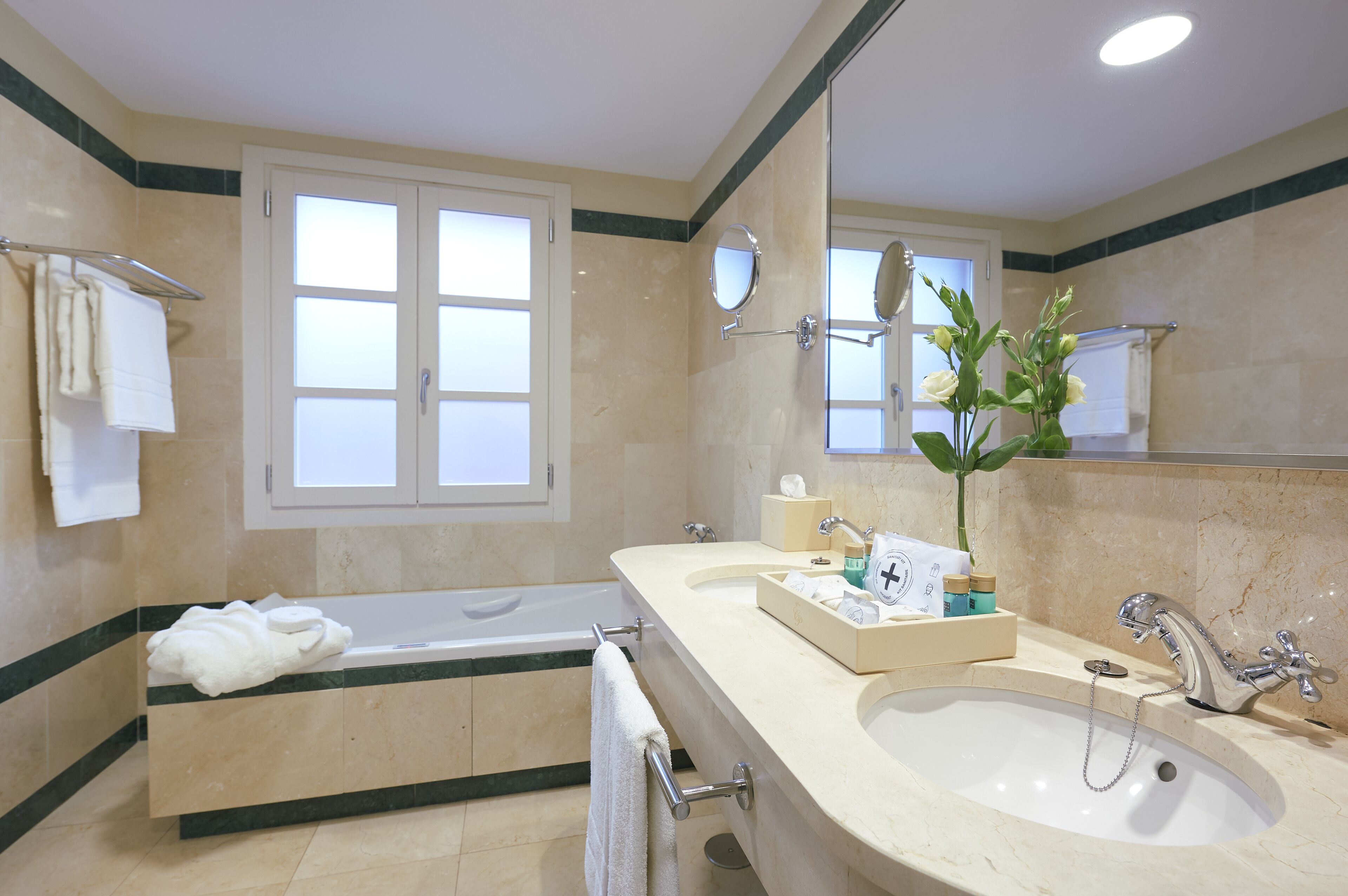 deluxe room | bathroom | hair dryer, bathrobes, slippers, towels
