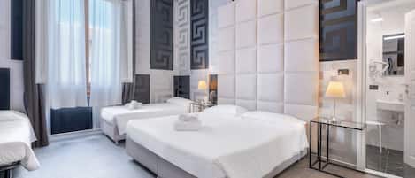 Quadruple Room | Down duvets, minibar, in-room safe, desk