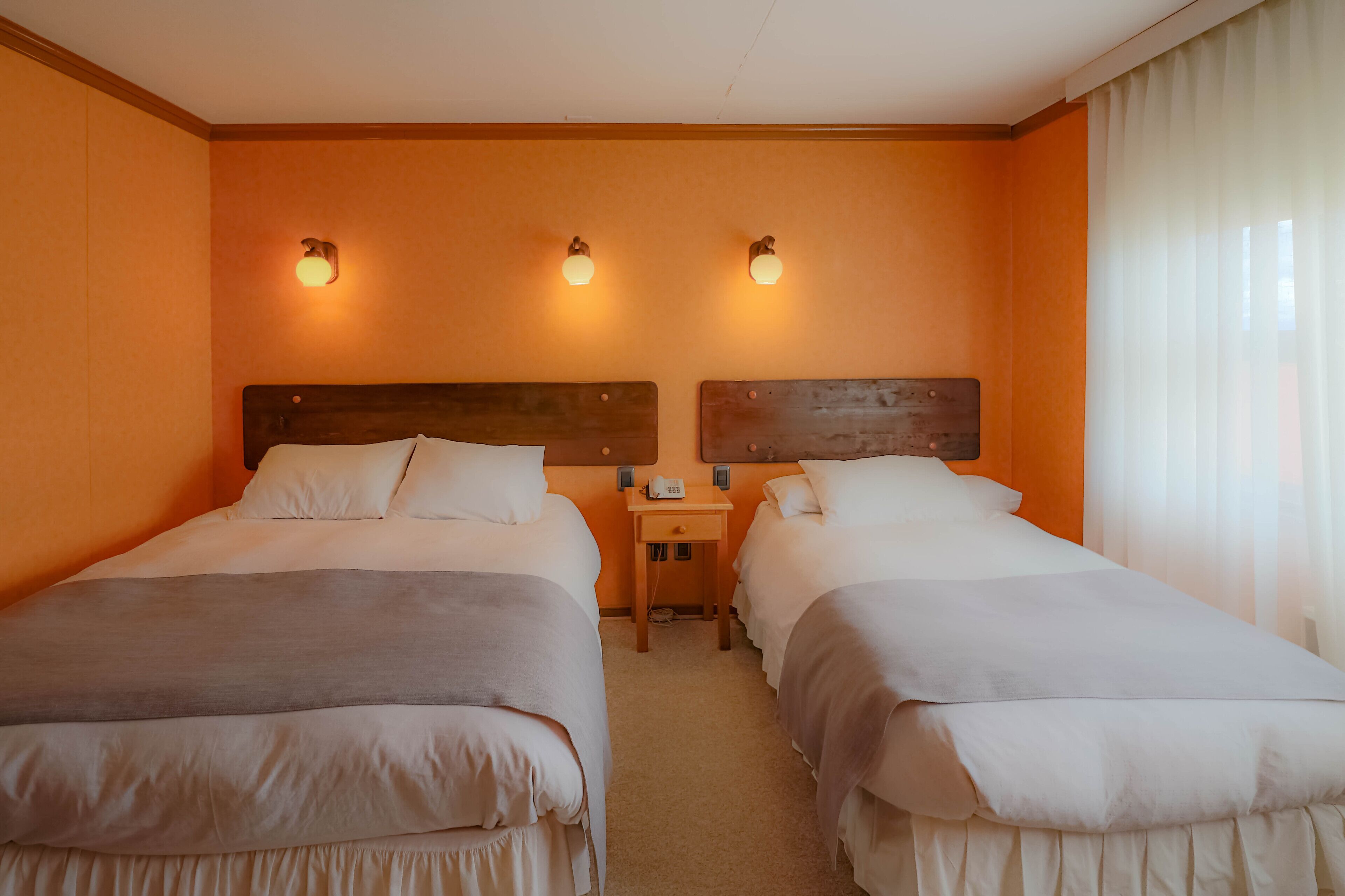 family triple room, mountain view | in-room safe, free cots/infant beds, bed sheets