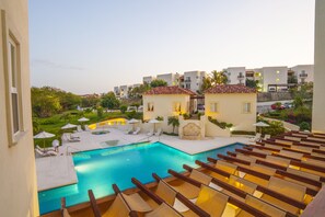 Outdoor pool, pool umbrellas, pool loungers