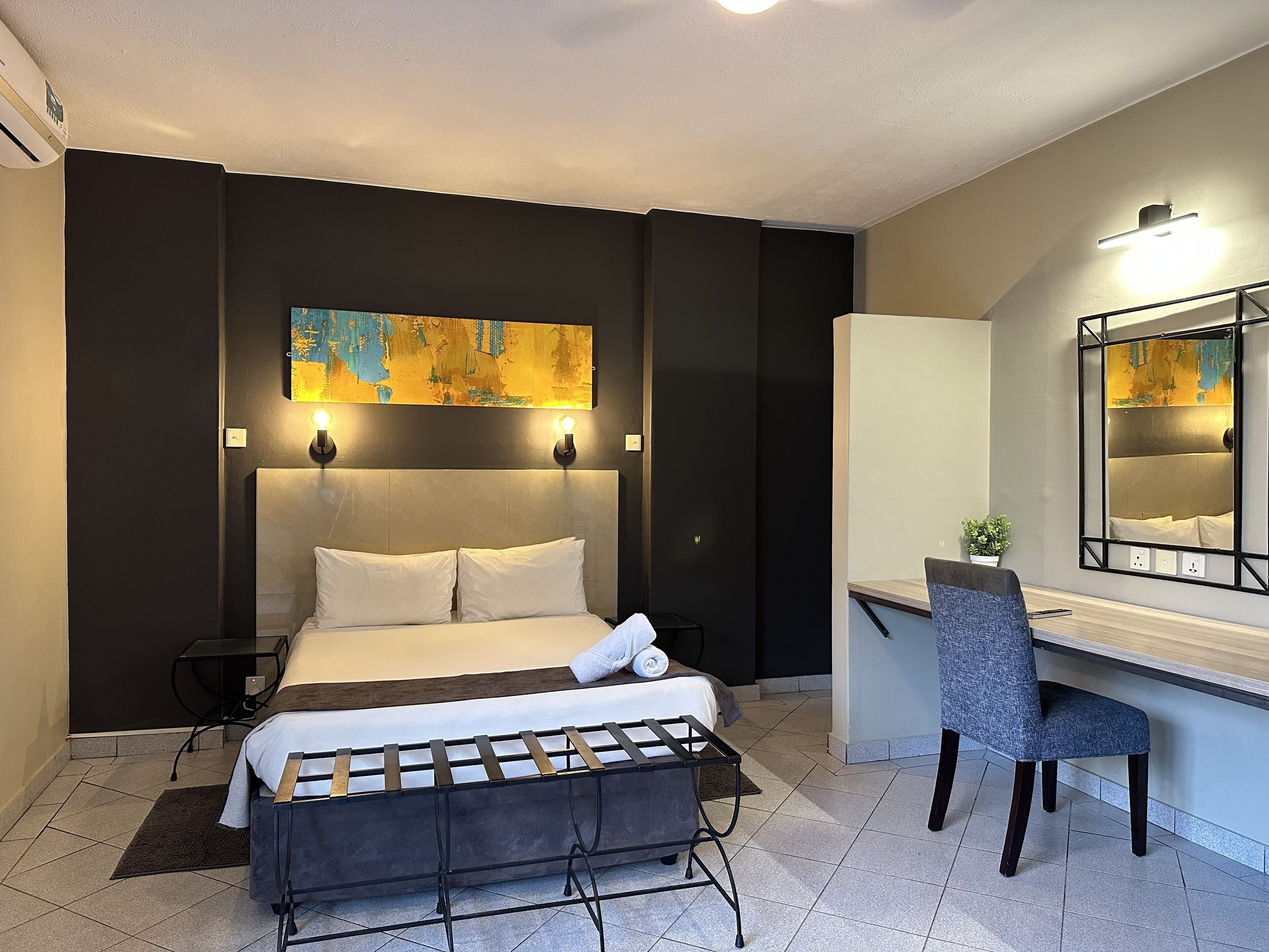 deluxe double room | in-room safe, desk, laptop workspace, blackout curtains