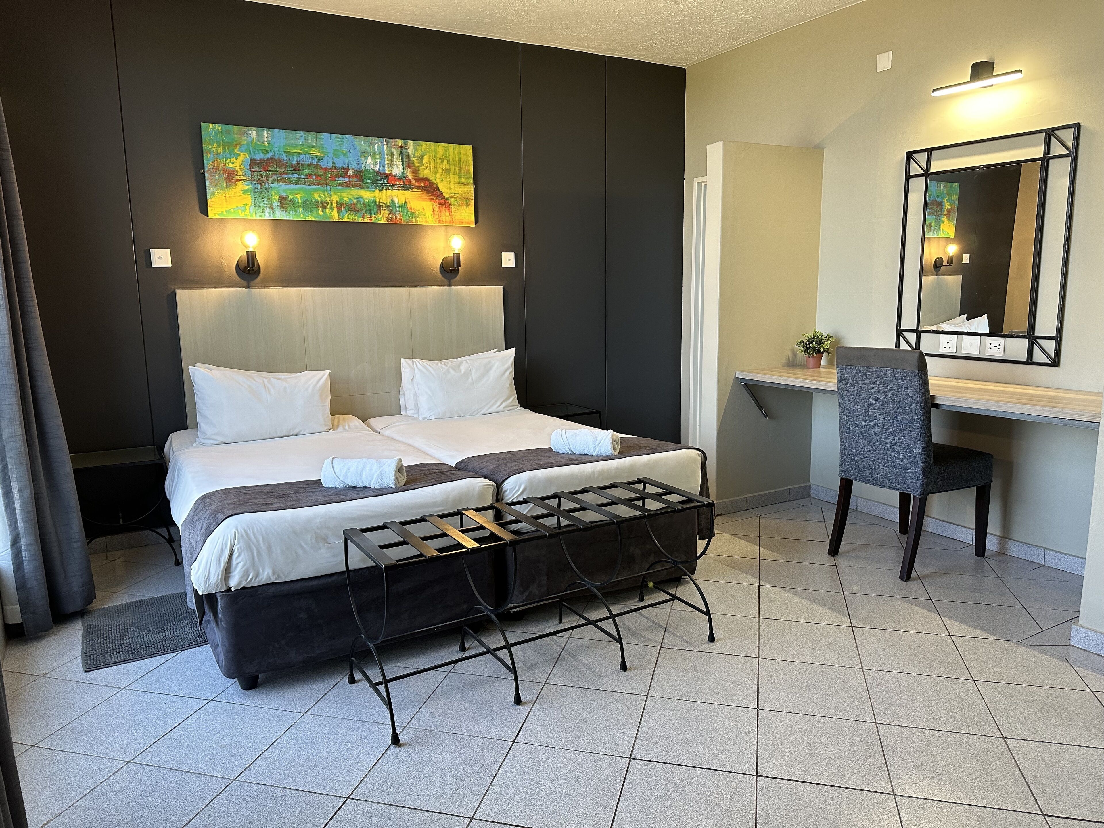 standard twin room | in-room safe, desk, laptop workspace, blackout curtains