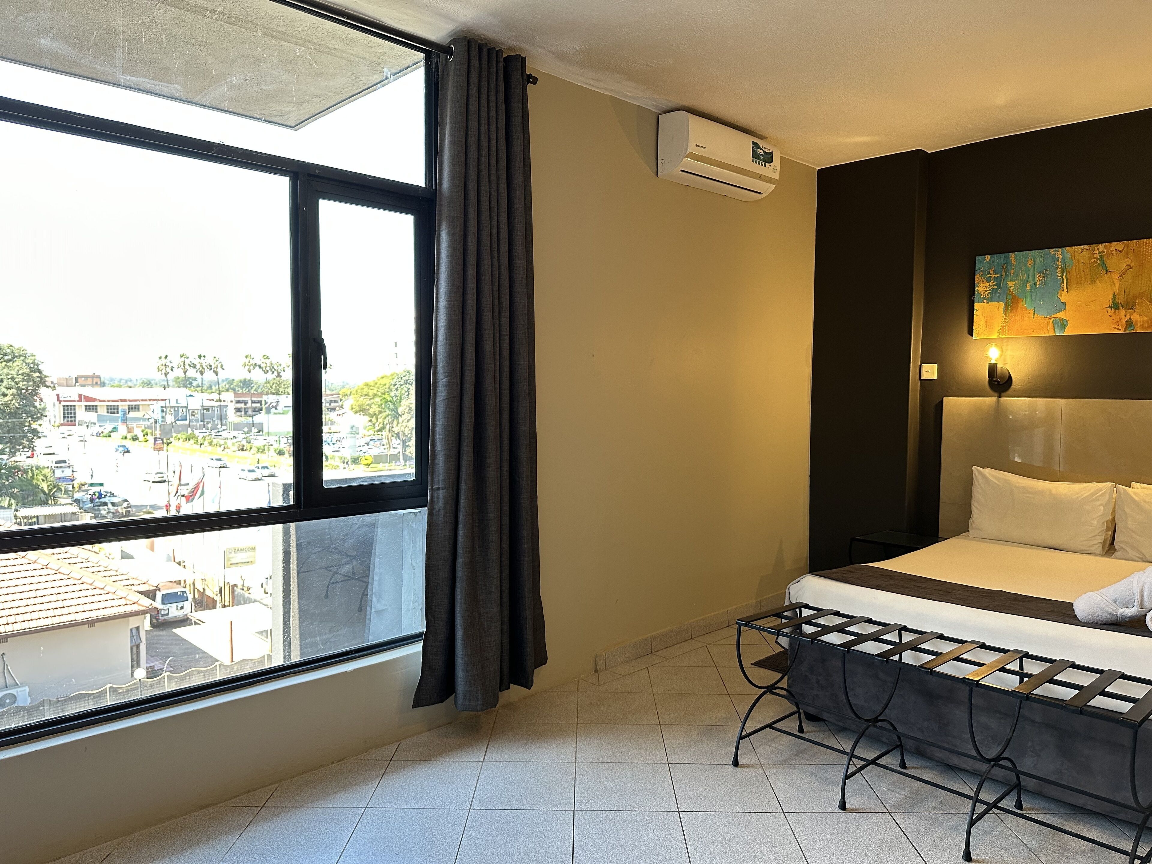 deluxe double room | in-room safe, desk, laptop workspace, blackout curtains