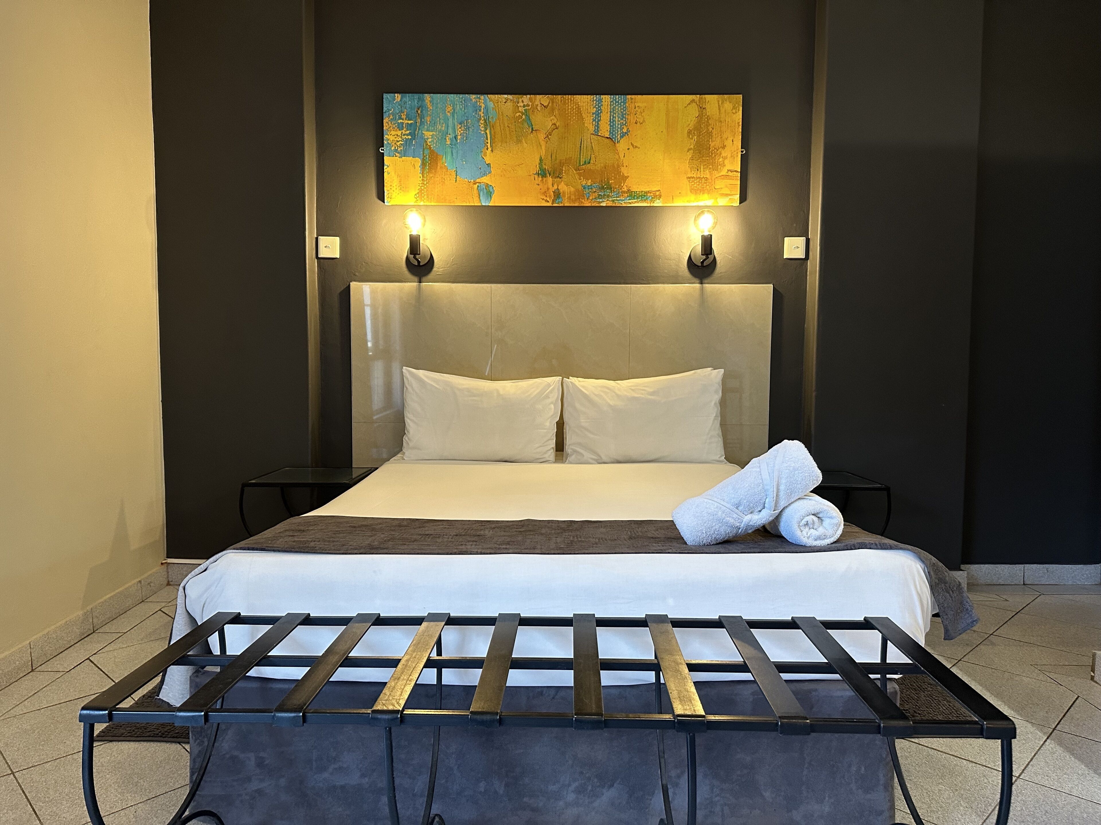 deluxe double room | in-room safe, desk, laptop workspace, blackout curtains