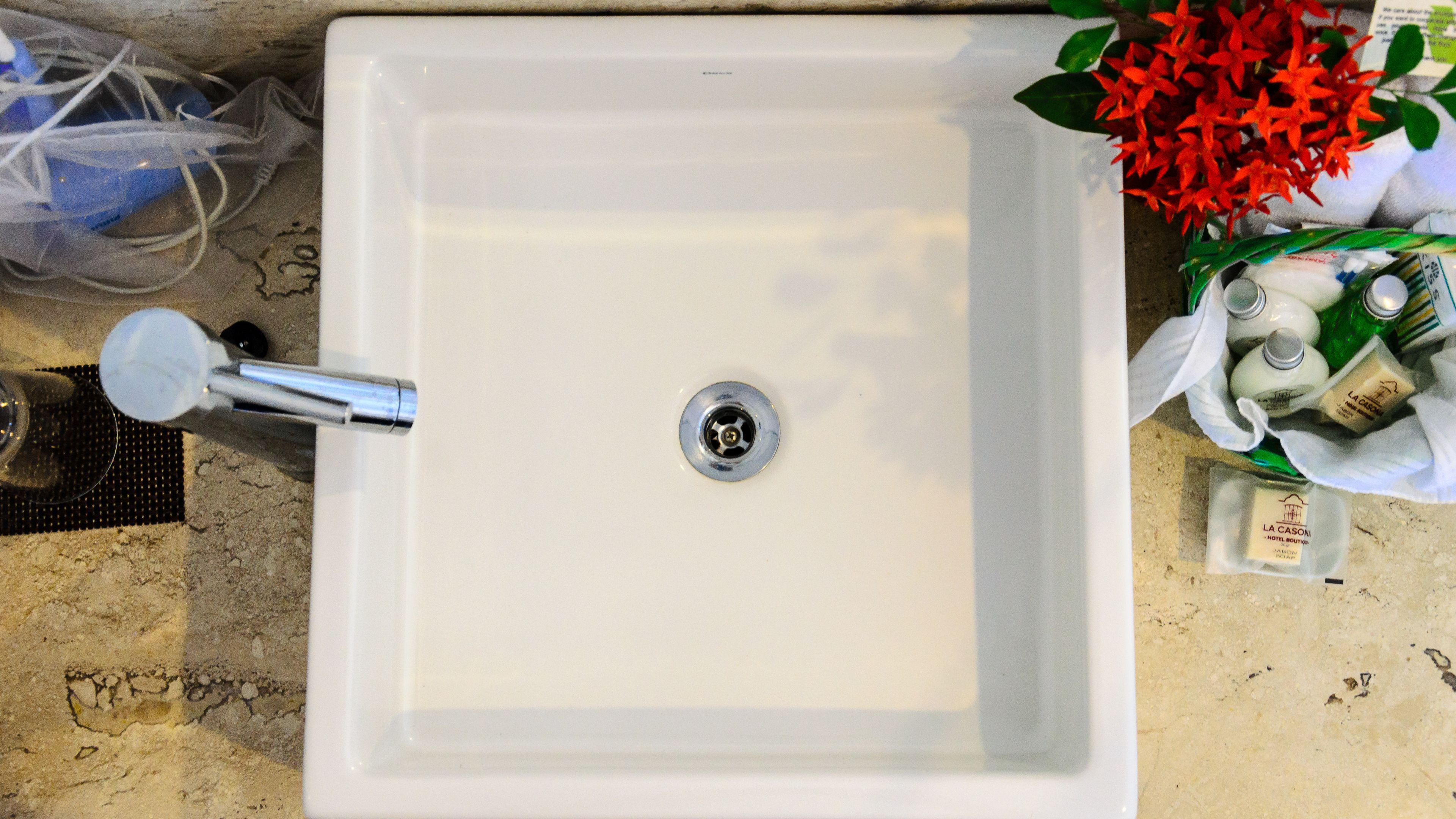 premium suite, 1 king bed, pool view, garden area | bathroom sink